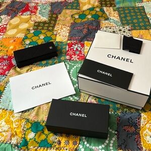 Chanel box, receipt envelope, glasses case